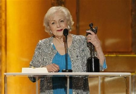 Betty White accepts the award for outstanding female actor in a comedy series for her role in ''Hot in Cleveland'' at the 17th annual Screen Actors Guild Awards in Los Angeles, California