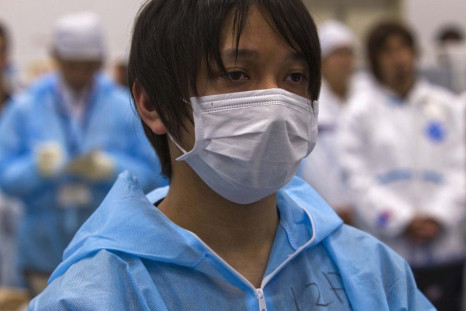 A worker inside the emergency operation center at the crippled Fukushima Daiichi nuclear power plant 