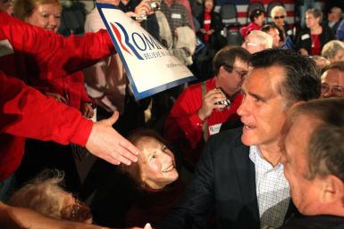 Republican U.S. presidential candidate Mitt Romney greets supporters after a town hall meeting at the Horry-Georgetown Technical College Grand Strand Conference Center in Myrtle Beach, South Carolina, December 17, 2011