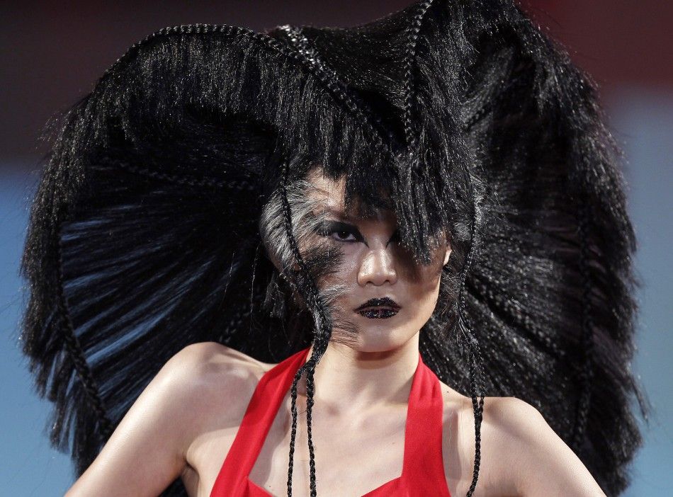 A model presents a creation during the 2012 Korea Hair Collection in Seoul December 6, 2011.