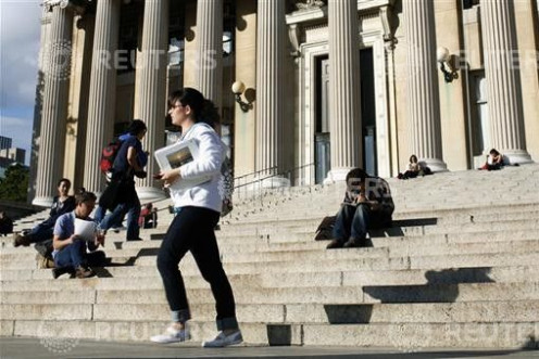 A student walks across the campus of Columbia University in New York
