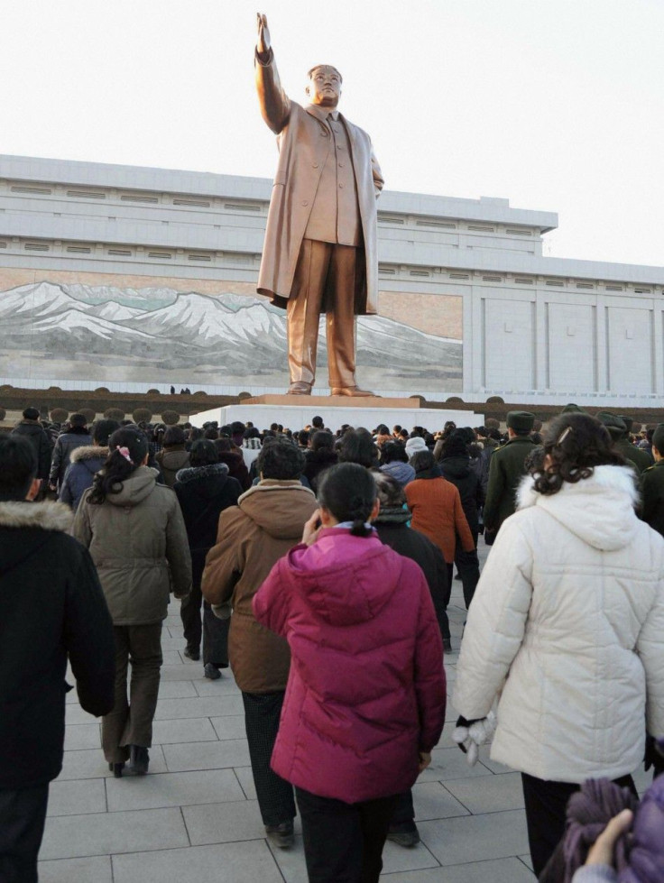 Pyongyang residents mourn the death of North Korean leader Kim Jong-il at a square on Mansu Hill in Pyongyang