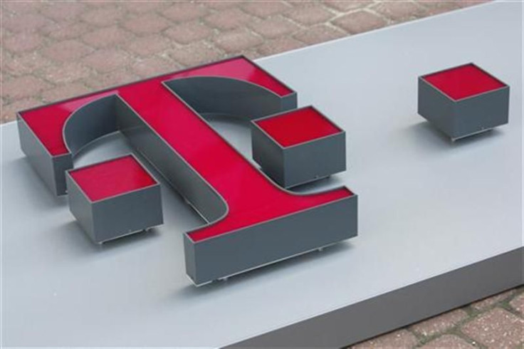 T-Mobile logo is ready to be placed on a former Era Mobile outlet in Warsaw