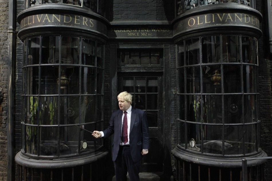London mayor Boris Johnson poses with a magic wand
