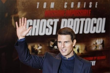 U.S. actor Tom Cruise poses on the red carpet during the UK premiere of the movie ''Mission: Impossible - Ghost Protocol'' in London