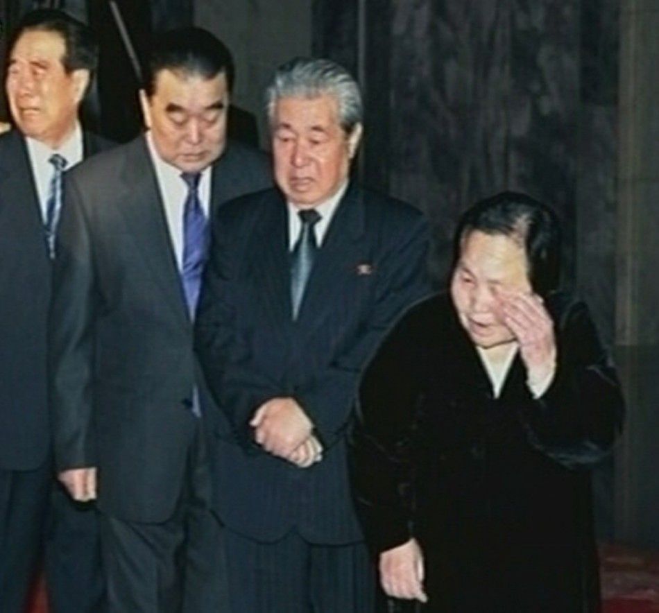 North Korea high level officials L to R Kim Phyong Hae, Thae Jong Su, Ju Kyu Chang and Kim Rak Hui mourn as they pay their last respects to former North Korean leader Kim Jong-il lying in state at the Kumsusan Memorial Palace in Pyongyang in this still 