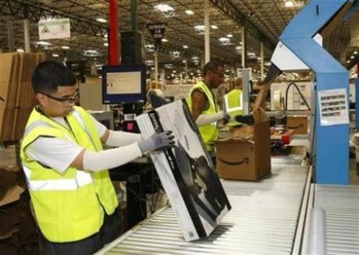 Employees at Amazon get merchandise ready to ship at the Phoenix Fulfillment Center in Goodyear, Arizona in this Nov. 2009 file photo