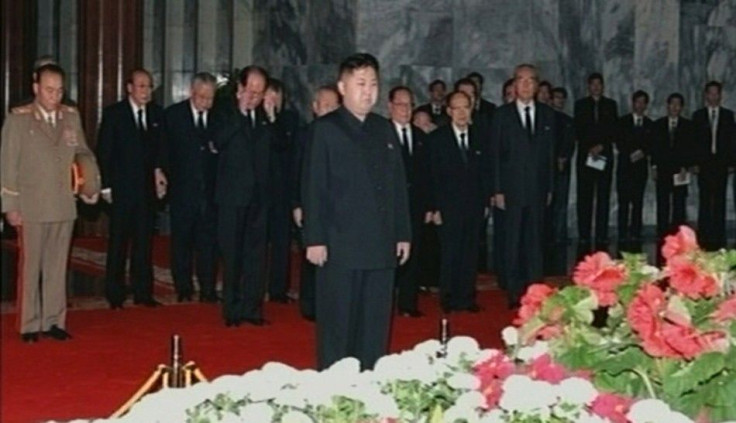 New North Korean ruler Kim Jong-un pays his respects to his father and former leader Kim Jong-il lying in state at the Kumsusan Memorial Palace in Pyongyang