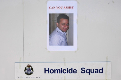 A poster of Nitin Garg of India is displayed on the side of a police information van near the park where he was stabbed in Melbourne Jan. 7, 2010. Accounting graduate Garg, 21, originally from the state of Punjab in northern India, was stabbed to death on