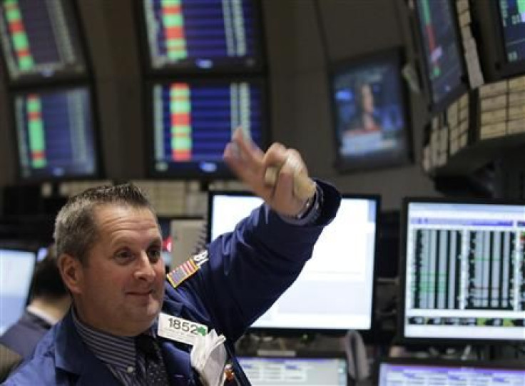 Traders work on the floor of the New York Stock Exchange