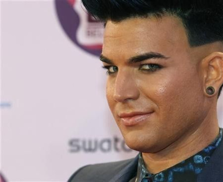 U.S. singer Adam Lambert poses on arrival on the red carpet at the MTV Europe Music Awards show in Belfast