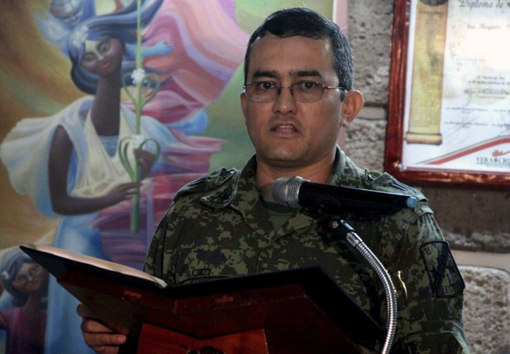 Jesus Miguel Sanchez Figueroa, spokesperson for the Sixth Military Region, addresses the media in Veracruz December 22, 2011.