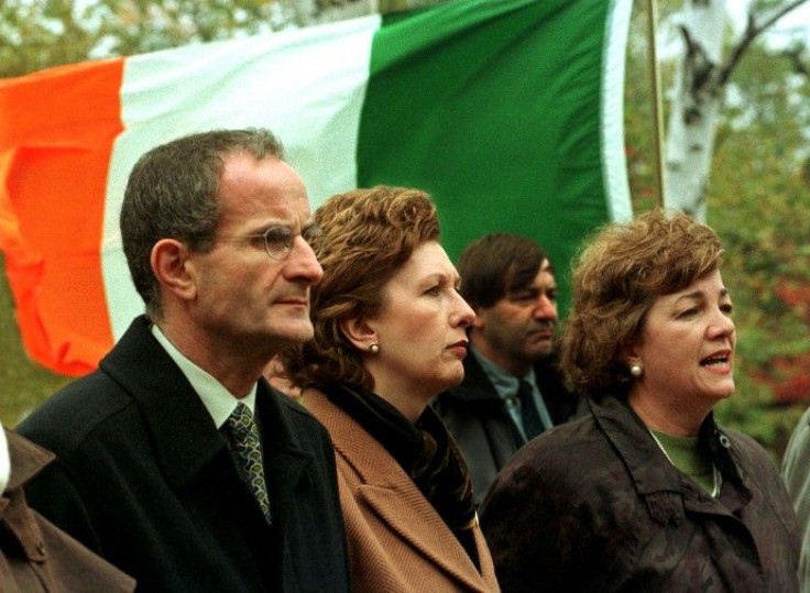 Ireland President Mary McAleese (C) and her husband Dr. Martin McAleese join Canadian Heritage Minister Sheila Copps (R) during a memorial ceremony in Grosse Ile near Quebec City October 11. McAleese paid tribute to the thousands of Irish immigrants who d