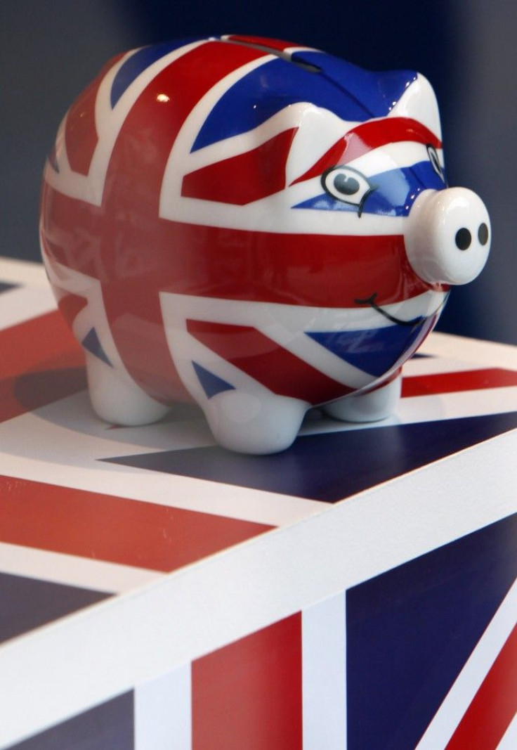 A piggy bank adorned with the colours of Britain's Union Jack flag is displayed in a souvenir shop in London