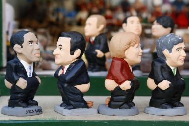Figurines known as &quot;caganer&quot;, of political leaders are sold at the Santa Llucia Christmas market