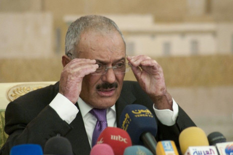 Yemen&#039;s outgoing President Ali Abdullah Saleh adjusts his spectacles during a news conference in Sanaa