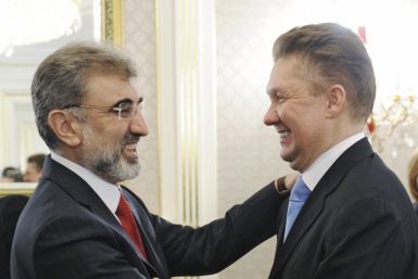 Gazprom CEO Miller greets Turkish Energy Minister Yildiz during their meeting in Moscow