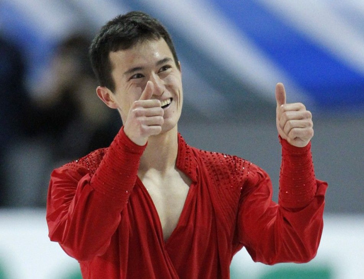 Canada's Patrick Chan gives thumbs up after getting his marks after the men's free skate program at the International Skating Union (ISU) Grand Prix of Figure Skating Finals at the Pavillon de la Jeunesse in Quebec City