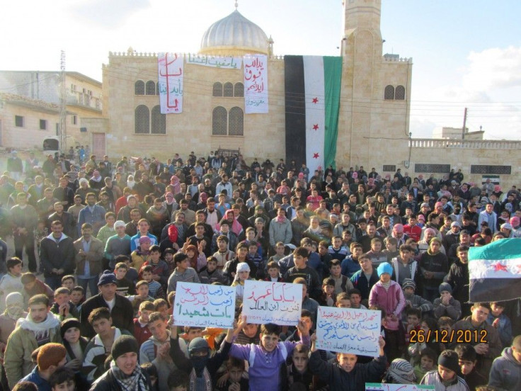 Demonstrators protest against Syrian President Bashar al-Assad in Ma&#039;arrat al-Numan near Adlb
