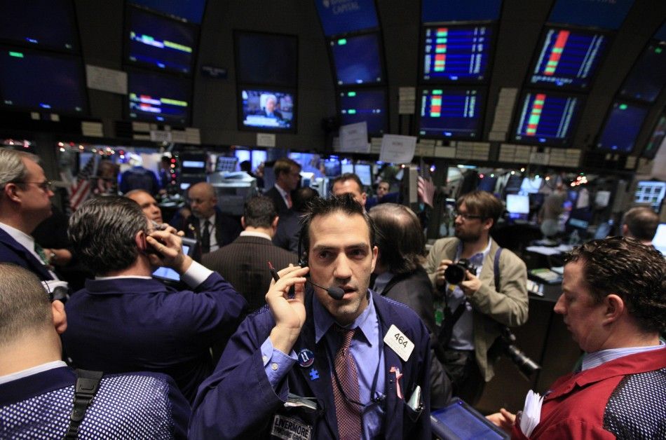 Stock brokers in the pit of the New York Stock Exchange