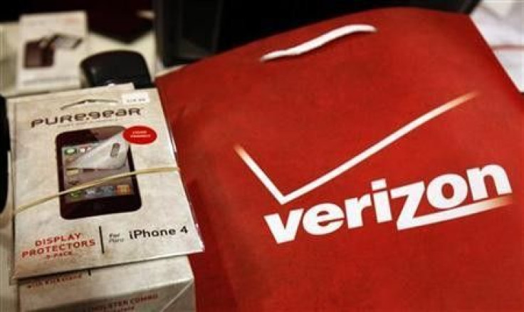 An iPhone 4 and accessories sit on a counter in a Verizon Wireless store shortly after the phone went on sale with Verizon service in New York