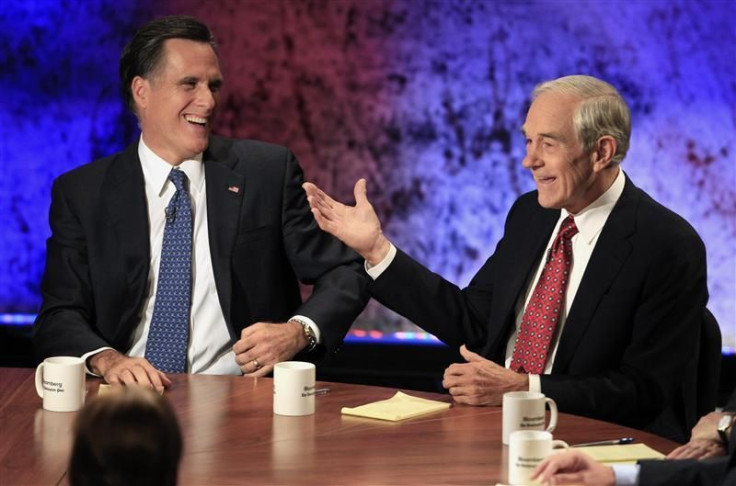 Mitt Romney (L) and Ron Paul