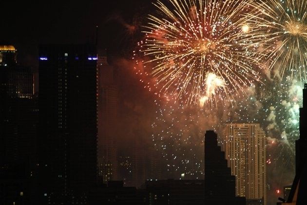 Fireworks explode during New Year celebrations over the city centre of Thailands capital Bangkok January 1, 2012.