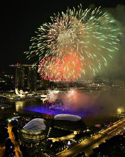 Fireworks explode over Marina Bay during New Year celebrations in Singapore January 1, 2012.