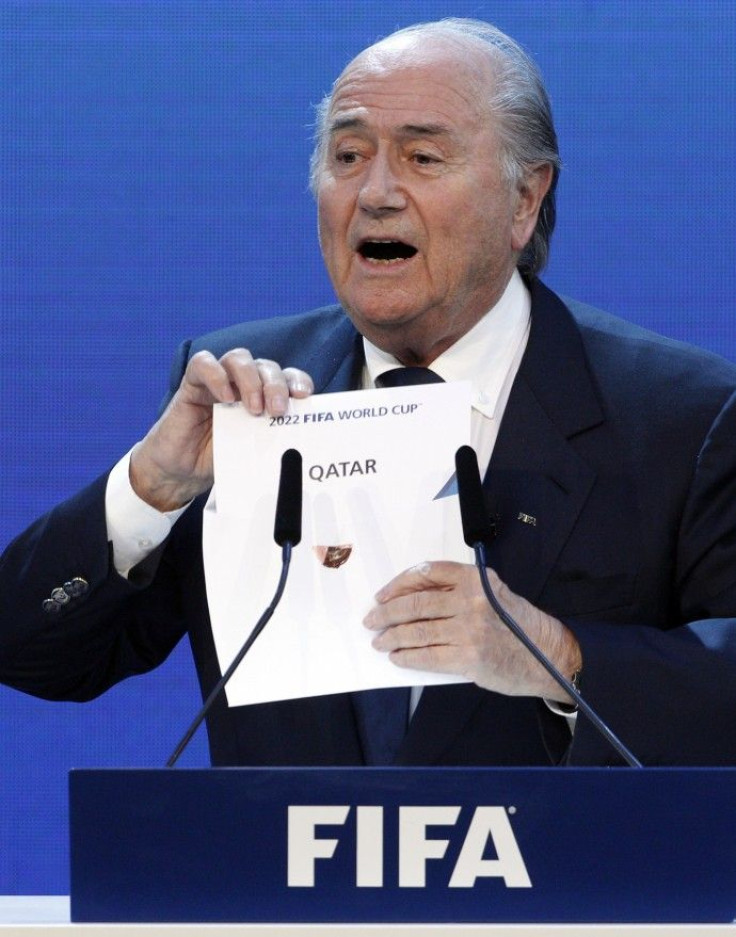 FIFA President Sepp Blatter announces Qatar as the host nation for the FIFA World Cup 2022 in Zurich.