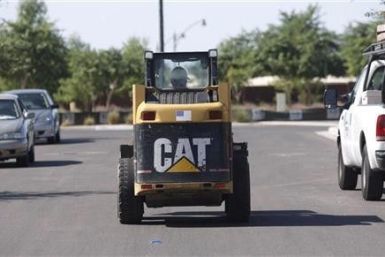 Caterpillar moves to lock out CAW workers