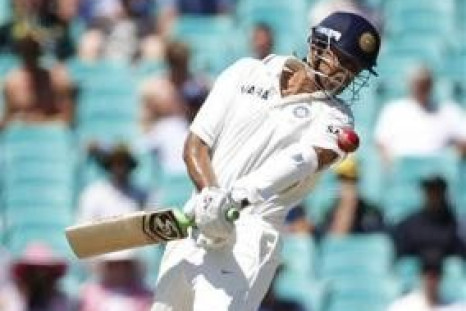 Rahul Dravid is struck by a ball from Australia&#039;s Peter Siddle during their second cricket test at the Sydney
