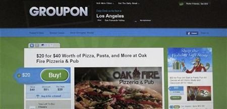 An online coupon sent via email from Groupon is pictured on a laptop screen in Los Angeles