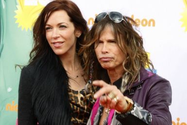 Singer Steven Tyler and Erin Brady pose at the 2011 Nickelodeon Kids Choice Awards in Los Angeles