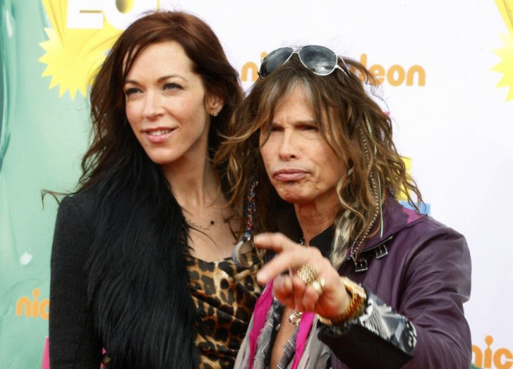 Singer Steven Tyler and Erin Brady pose at the 2011 Nickelodeon Kids Choice Awards in Los Angeles
