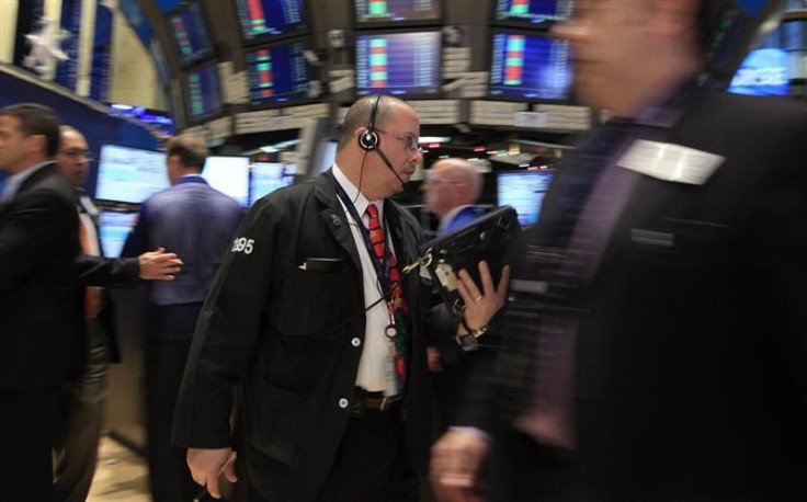 Traders work on the floor of the New York Stock Exchange