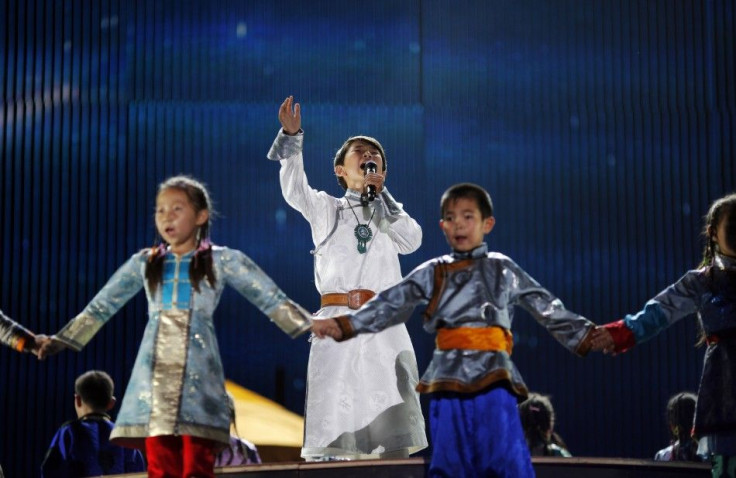 A boy sings during the final round of &quot;China&#039;s Got Talent&quot; in Shanghai