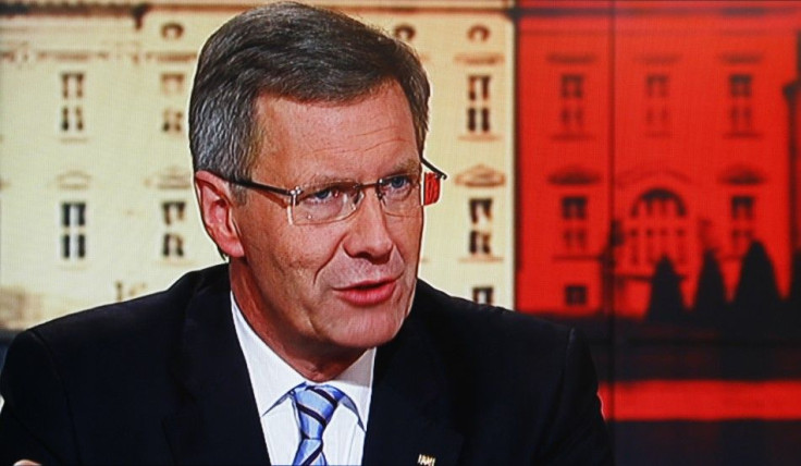 German President Wulff is pictured on a TV monitor during the recording of a television interview in Berlin