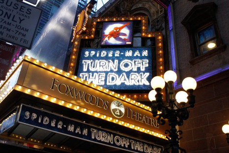 Banners advertising the Broadway play &quot;Spiderman: Turn Off The Dark&quot; shine in front of the Foxwoods Theater in New York