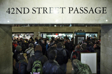 Protesters affiliated with the Occupy Wall Street movement hold a protest inside of Grand Central Station in New York