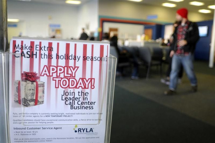 A flyer advertising holiday job listings is seen at the North Metro Department of Labor Career Center in Atlanta