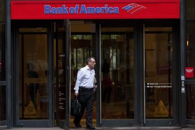 A Bank of America customer leaves a banking branch in Charlotte, North Carolina