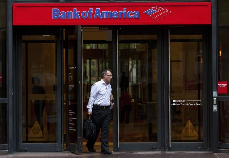 A Bank of America customer leaves a banking branch in Charlotte, North Carolina