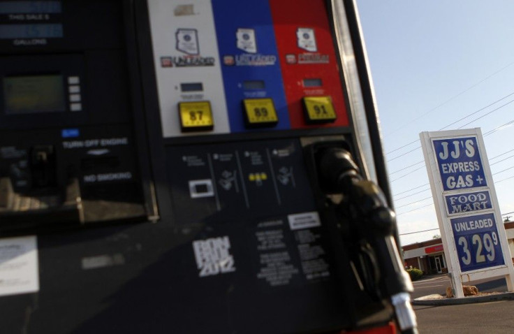 Unleaded gas price is displayed at JJ&#039;s Express Gas Plus station in Phoenix gas station in Phoenix, Arizona August 10, 2011