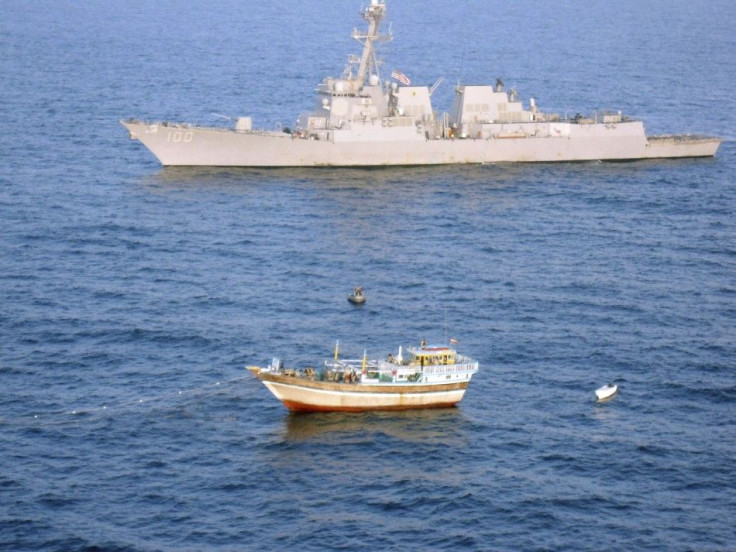 The guided-missile destroyer USS Kidd responds to a distress call from the master of the Iranian-flagged fishing dhow Al Molai, who claimed he was being held captive by pirates in the Arabian Sea