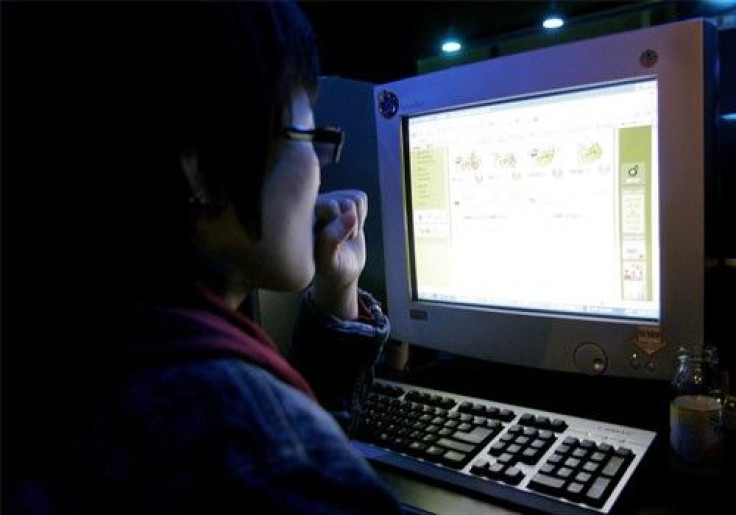 A South Korean surfs the Web at an Internet cafe in Seoul