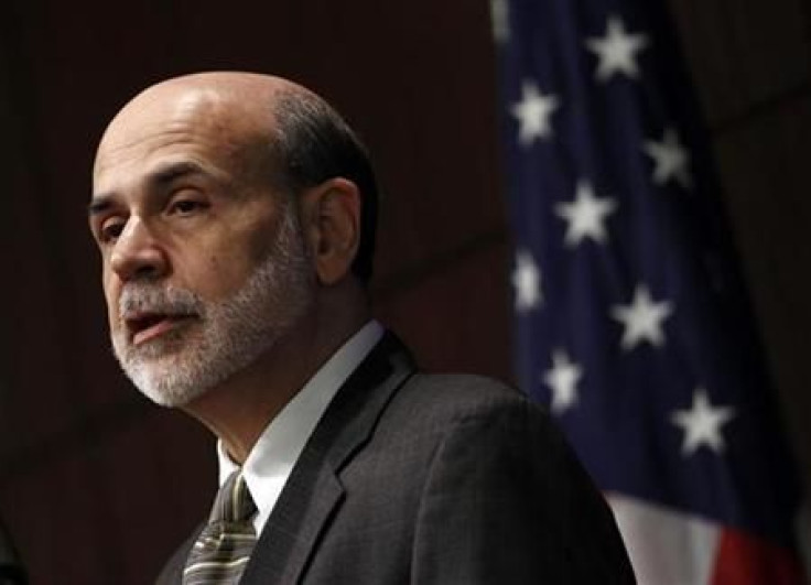 Chairman of the Federal Reserve Ben Bernanke delivers opening remarks at a Federal Reserve System symposium in Arlington, Virginia