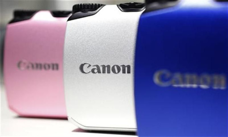 Canon digital cameras are displayed at the company&#039;s showroom in Tokyo