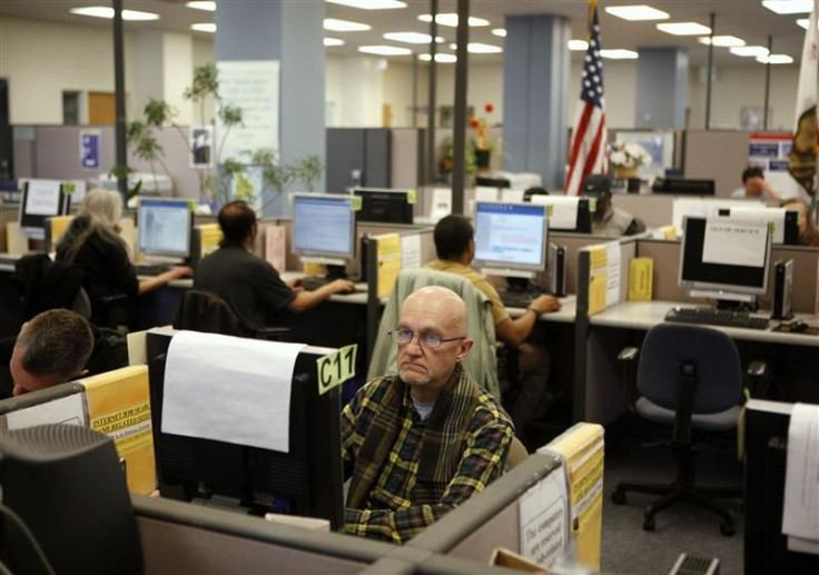 Johnson looks for warehouse work online at the Employment Development Department of California service office in San Francisco