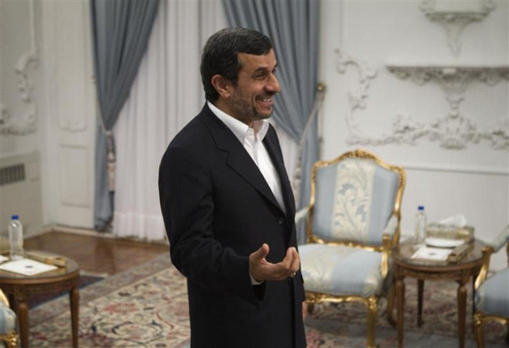 Iranian President Ahmadinejad speaks with Iran&#039;s Foreign Minister Salehi in Tehran