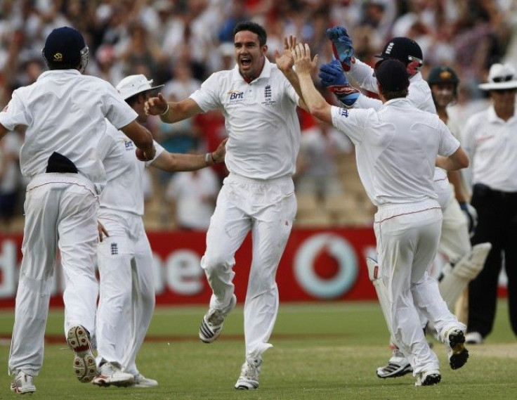 England's Pietersen celebrates with teammates after claiming the wicket of Australia's Clarke during the fourth day of the second Ashes cricket test in Adelaide.